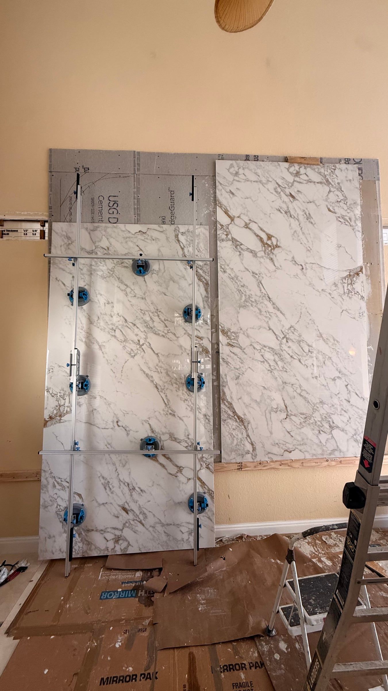 Double-Height Porcelain Slab Media Wall in Sarasota, FL — photo 2 of 17