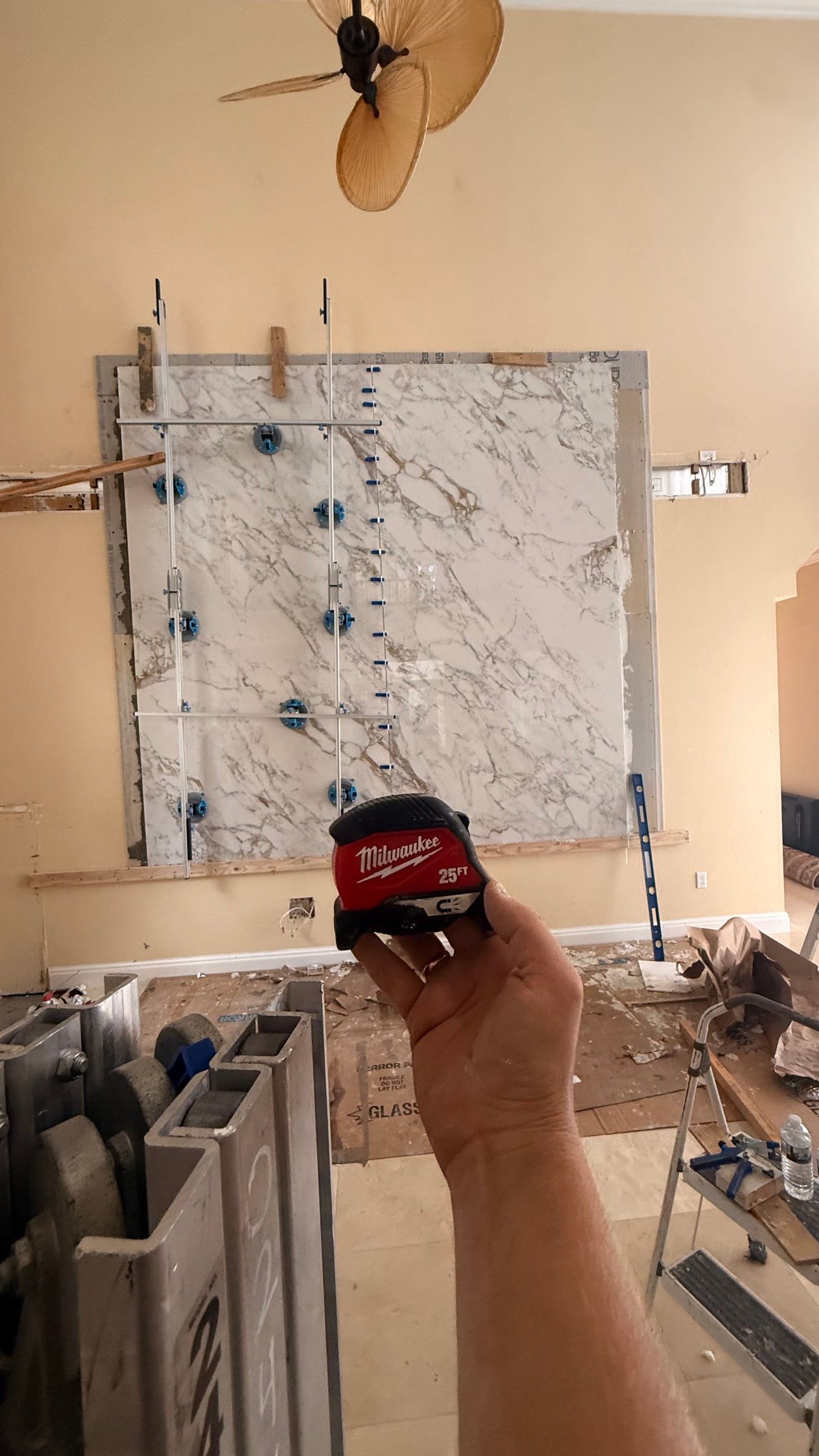 Double-Height Porcelain Slab Media Wall in Sarasota, FL — photo 3 of 17