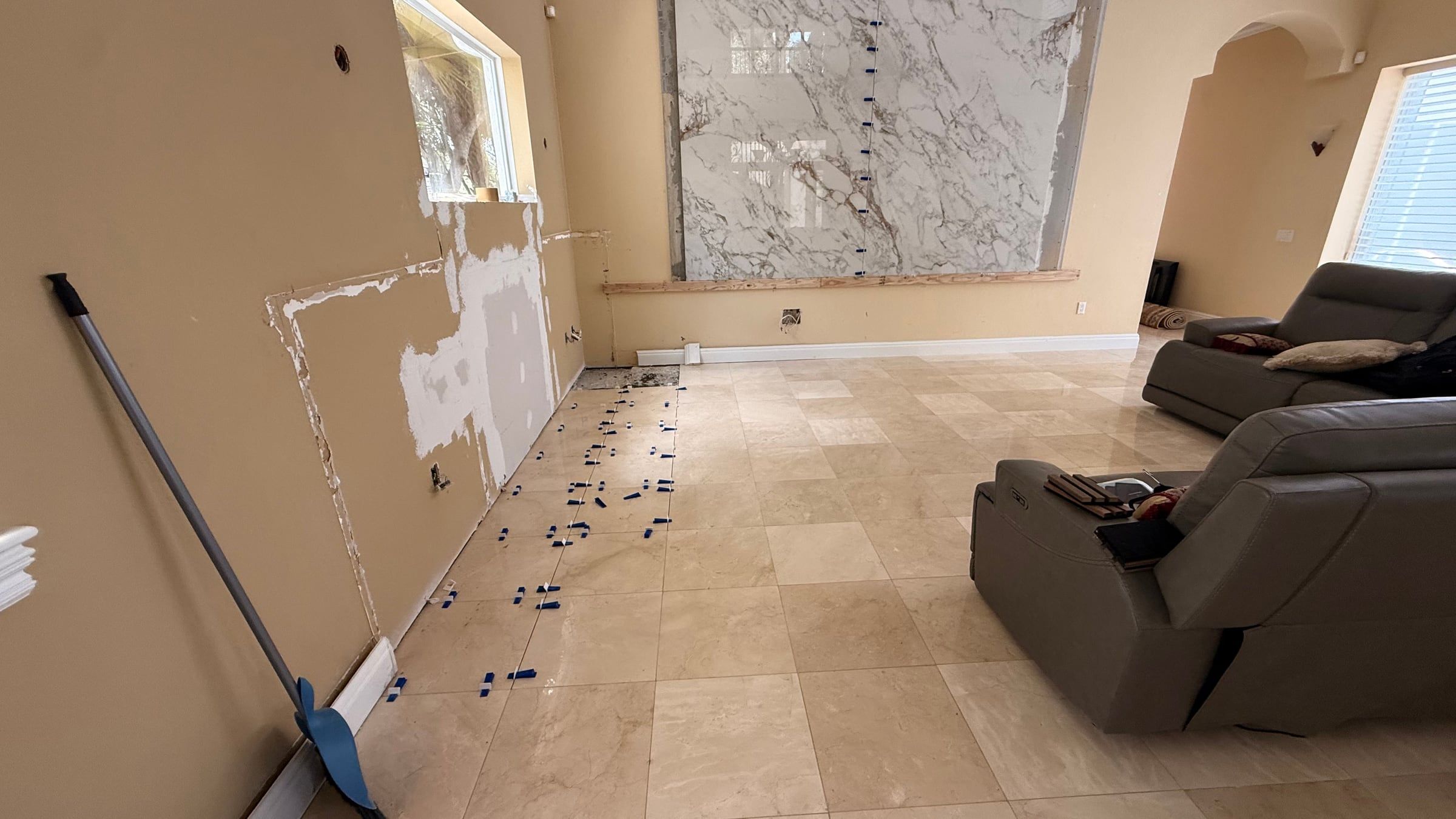 Double-Height Porcelain Slab Media Wall in Sarasota, FL — photo 5 of 17