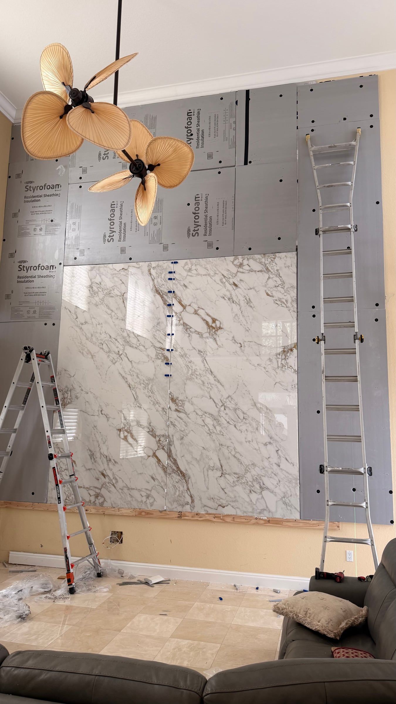 Double-Height Porcelain Slab Media Wall in Sarasota, FL — photo 7 of 17