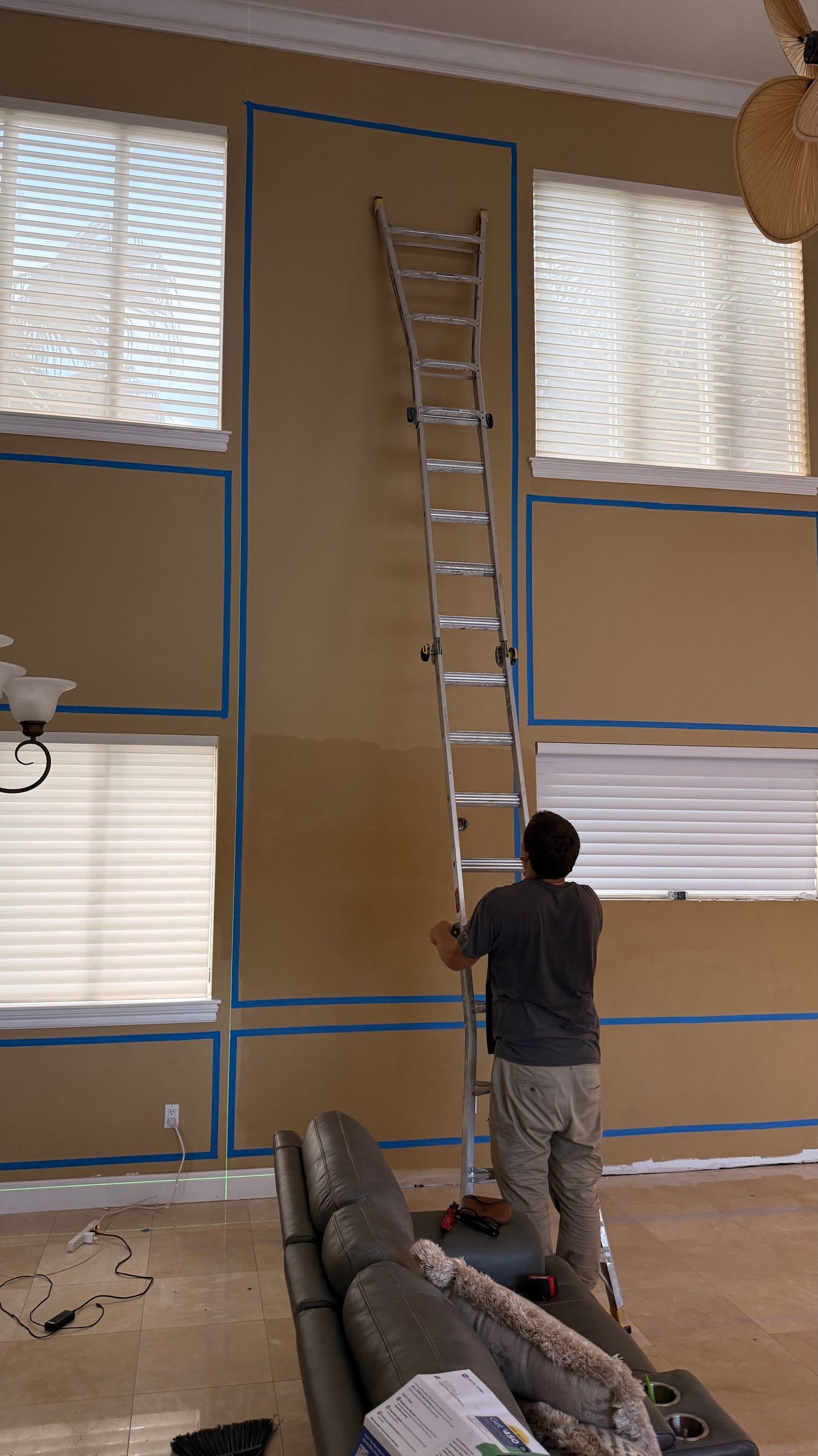 Double-Height Porcelain Slab Media Wall in Sarasota, FL — photo 8 of 17