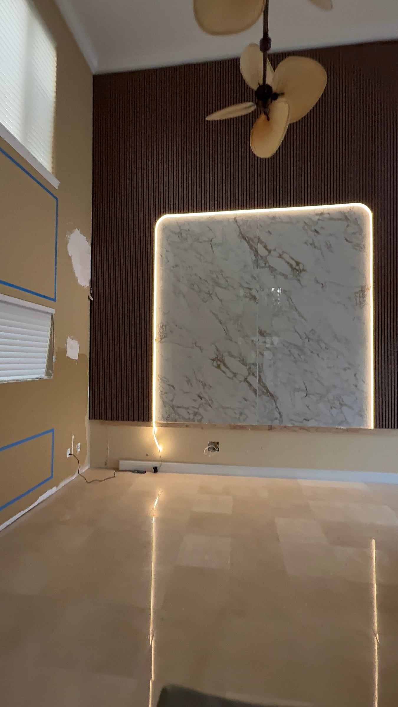 Double-Height Porcelain Slab Media Wall in Sarasota, FL — photo 9 of 17