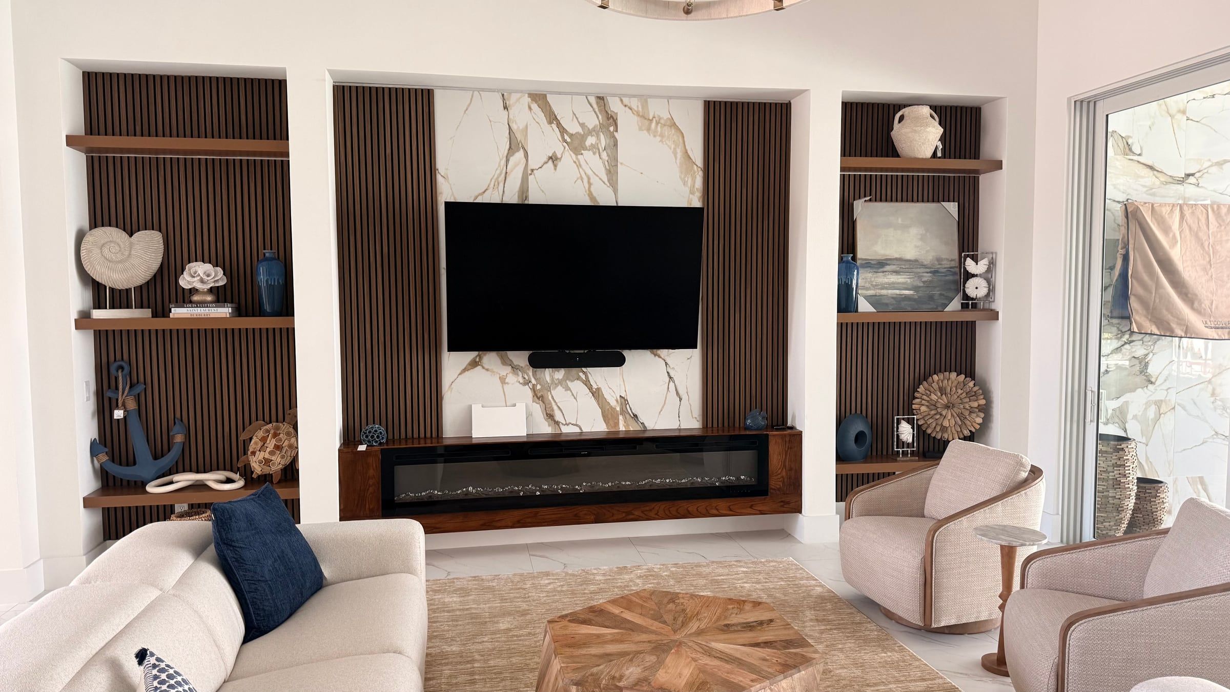 Media Wall with Built-In Shelving and a Tray Ceiling Detail in Sarasota, FL — photo 6 of 8