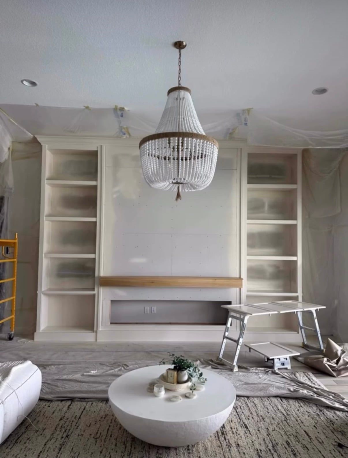 Media Wall with Lit Built-In Shelving and Electric Fireplace in Davenport, FL — photo 1 of 4