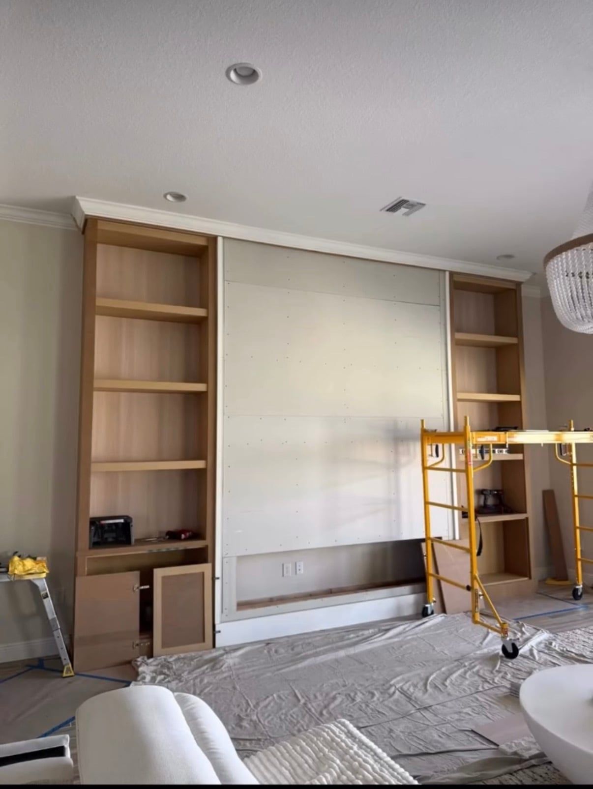 Media Wall with Lit Built-In Shelving and Electric Fireplace in Davenport, FL — photo 3 of 4