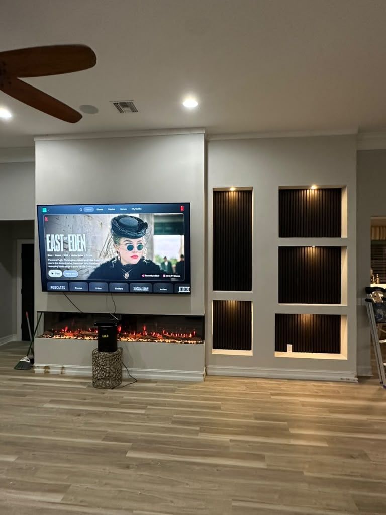 Media Wall with Lit Display Niches and Linear Fireplace in Melbourne, FL — photo 1 of 27