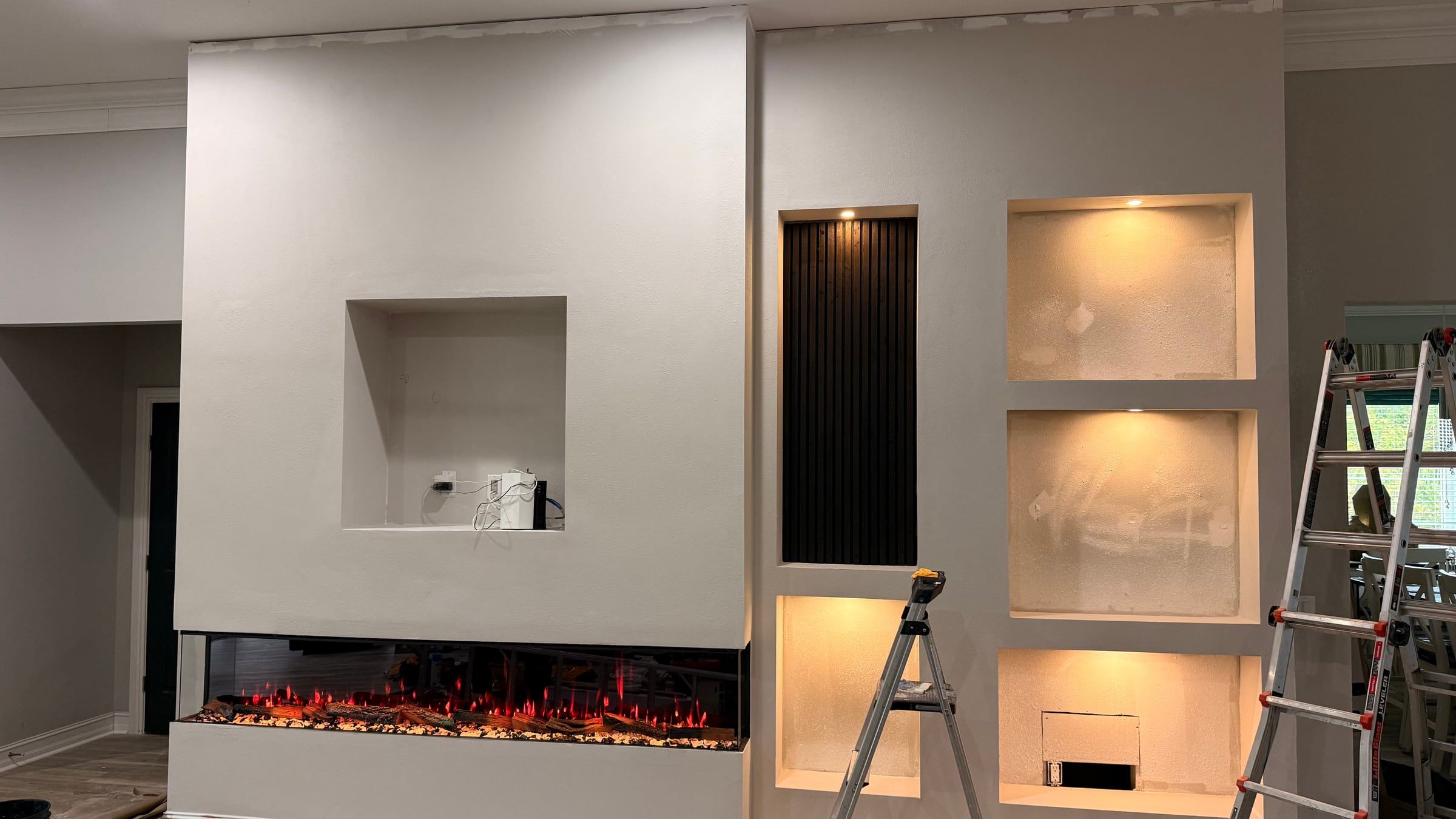 Media Wall with Lit Display Niches and Linear Fireplace in Melbourne, FL — photo 12 of 27