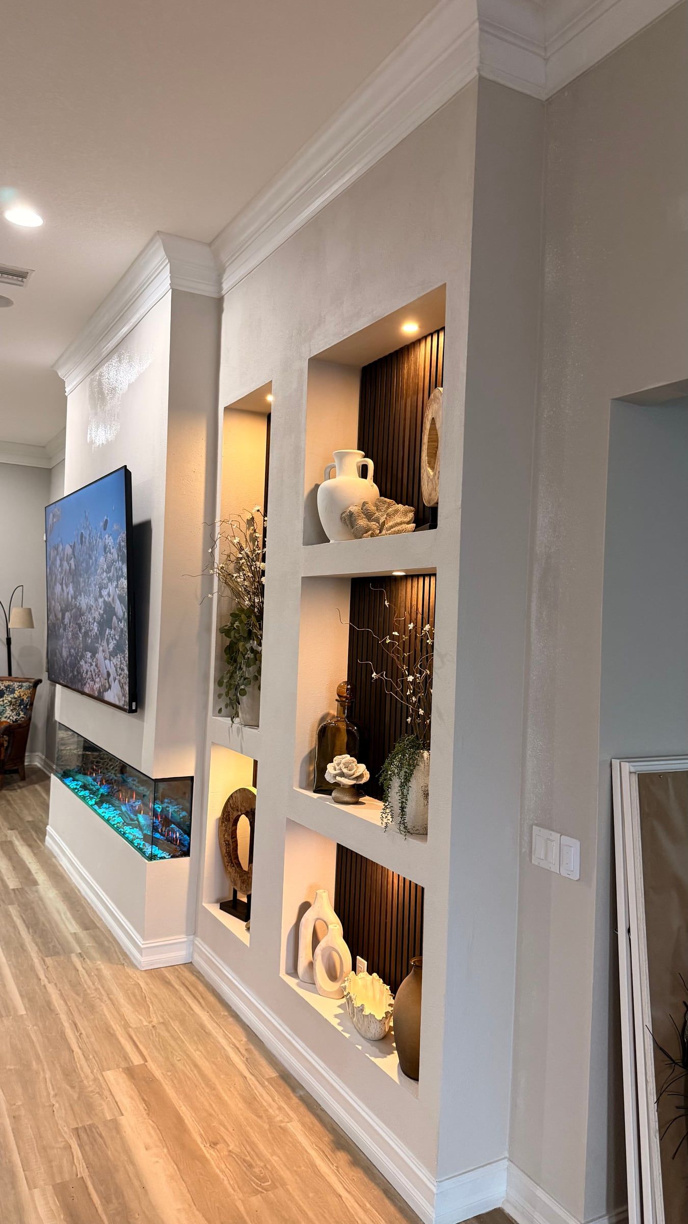 Media Wall with Lit Display Niches and Linear Fireplace in Melbourne, FL — photo 16 of 27