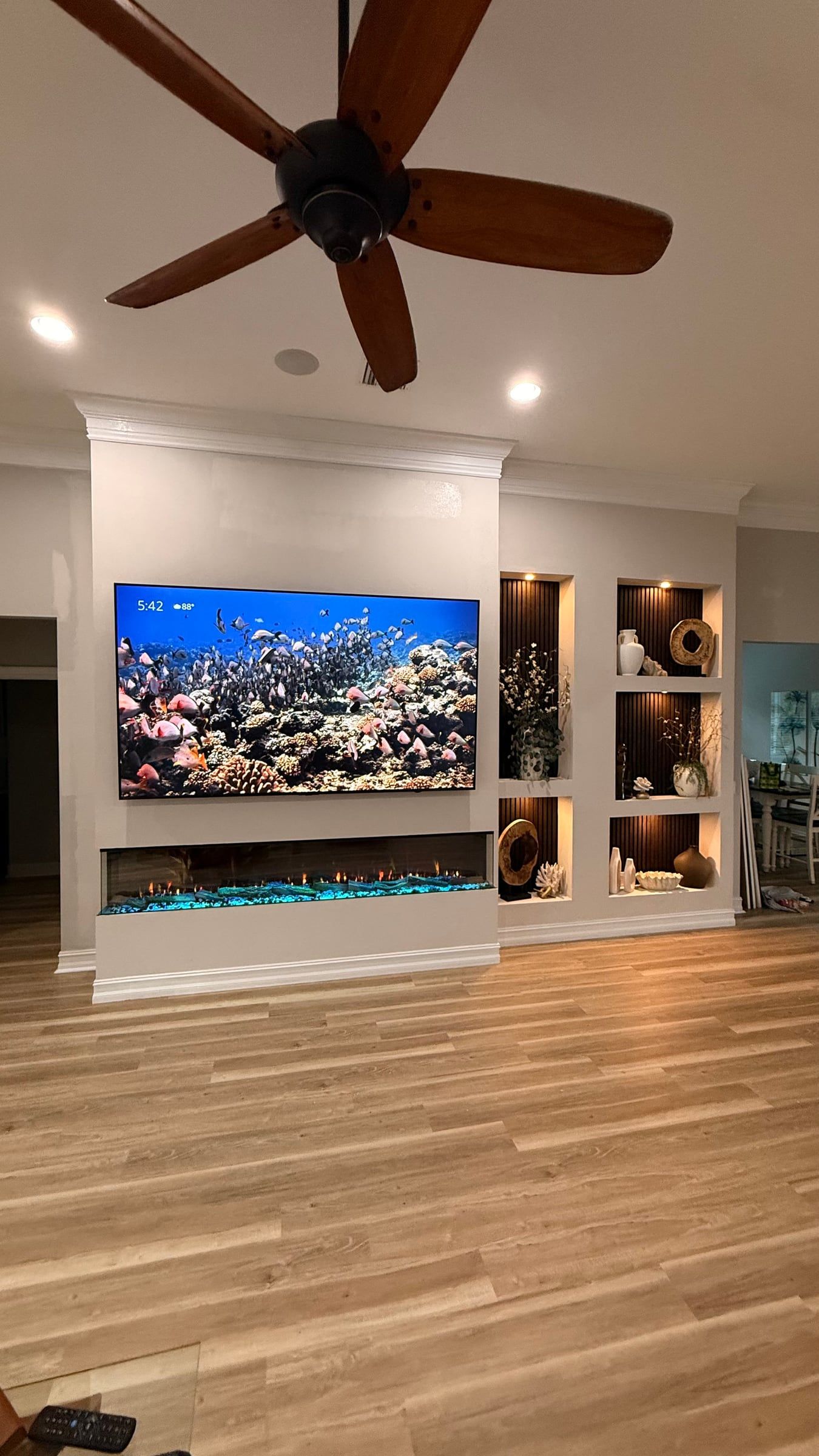 Media Wall with Lit Display Niches and Linear Fireplace in Melbourne, FL — photo 18 of 27
