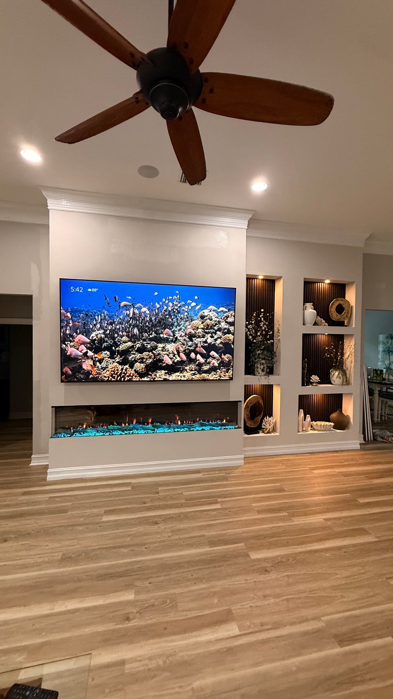 Media Wall with Lit Display Niches and Linear Fireplace in Melbourne, FL — photo 19 of 27