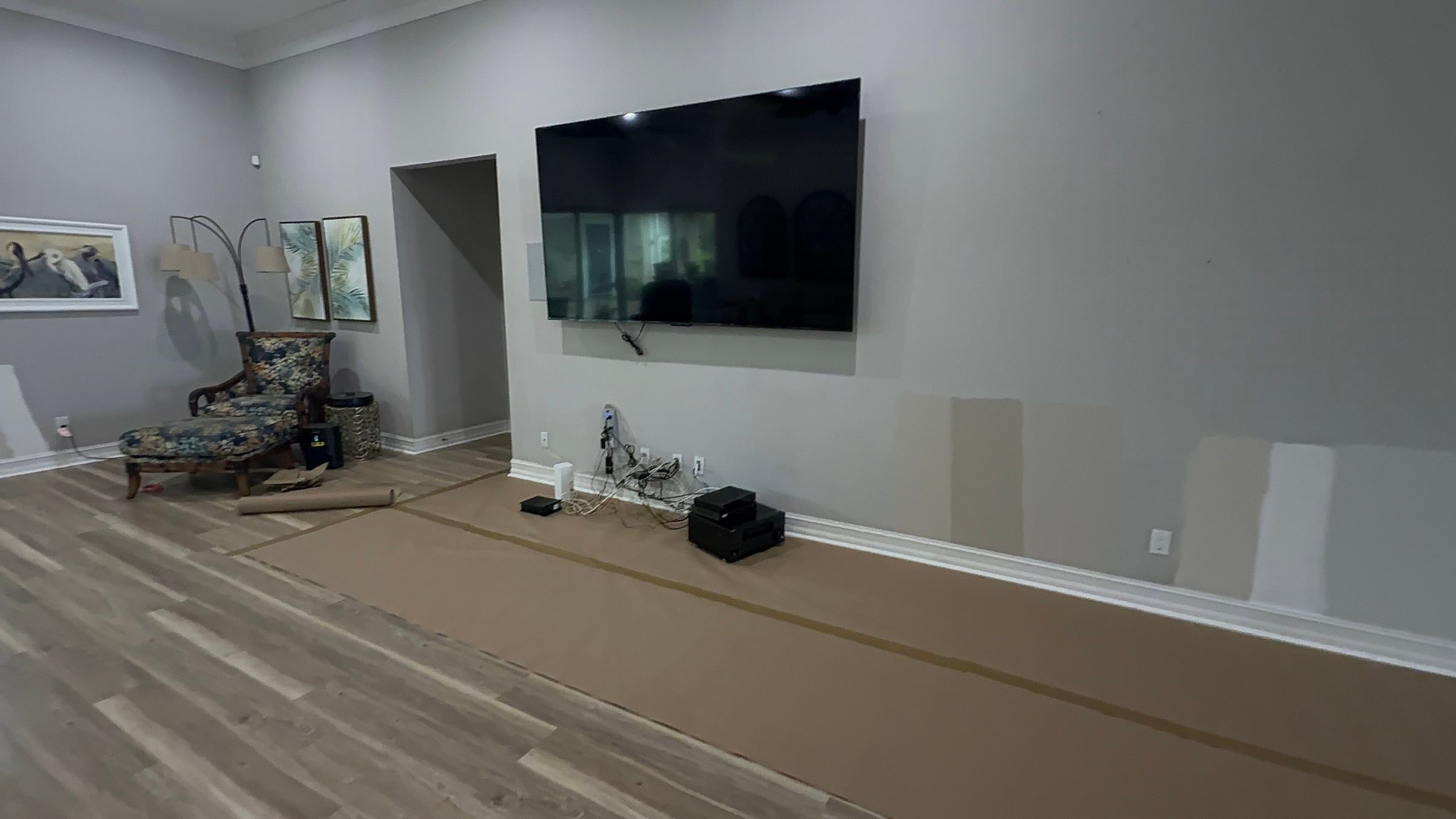 Media Wall with Lit Display Niches and Linear Fireplace in Melbourne, FL — before