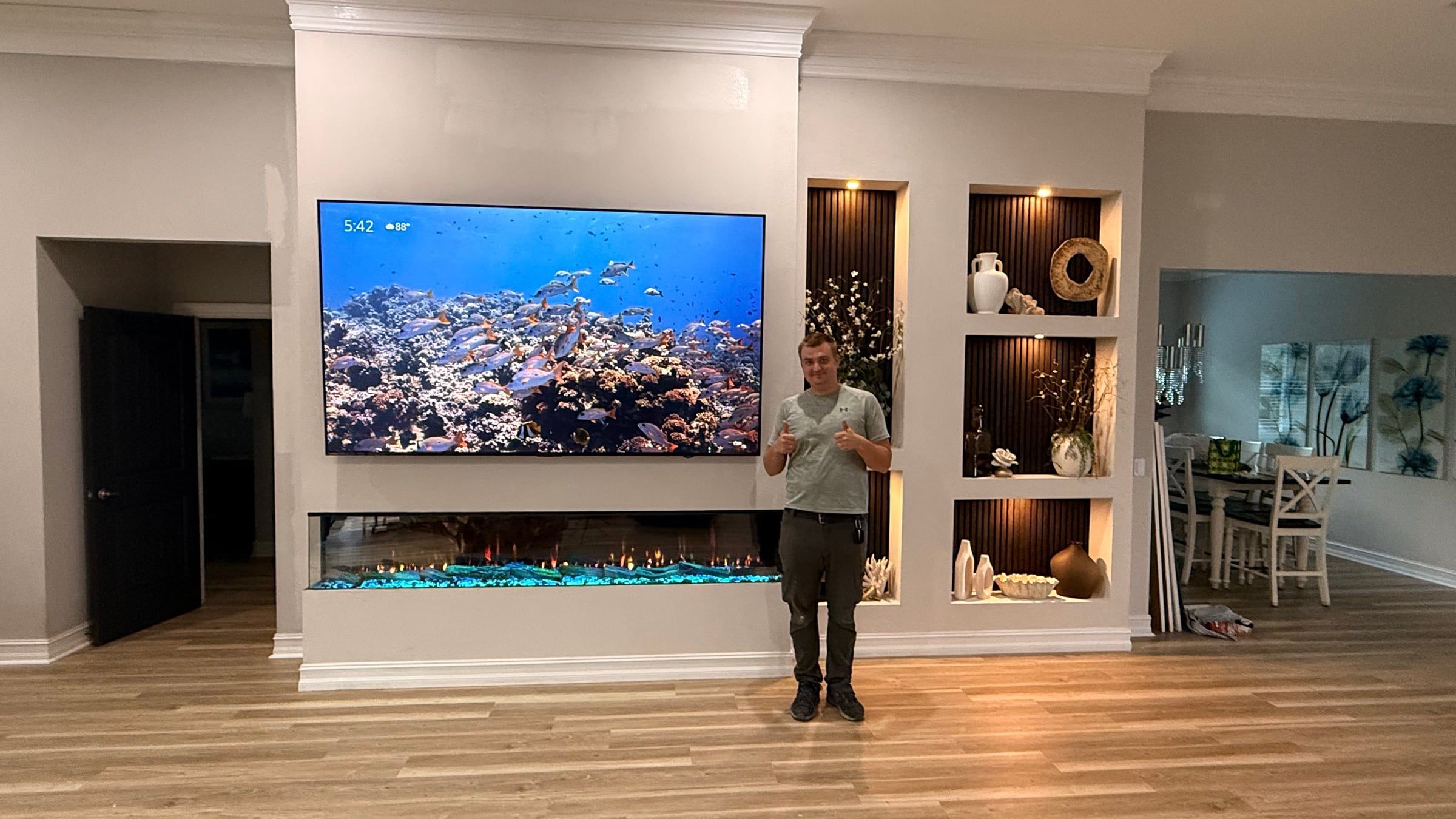 Media Wall with Lit Display Niches and Linear Fireplace in Melbourne, FL — after