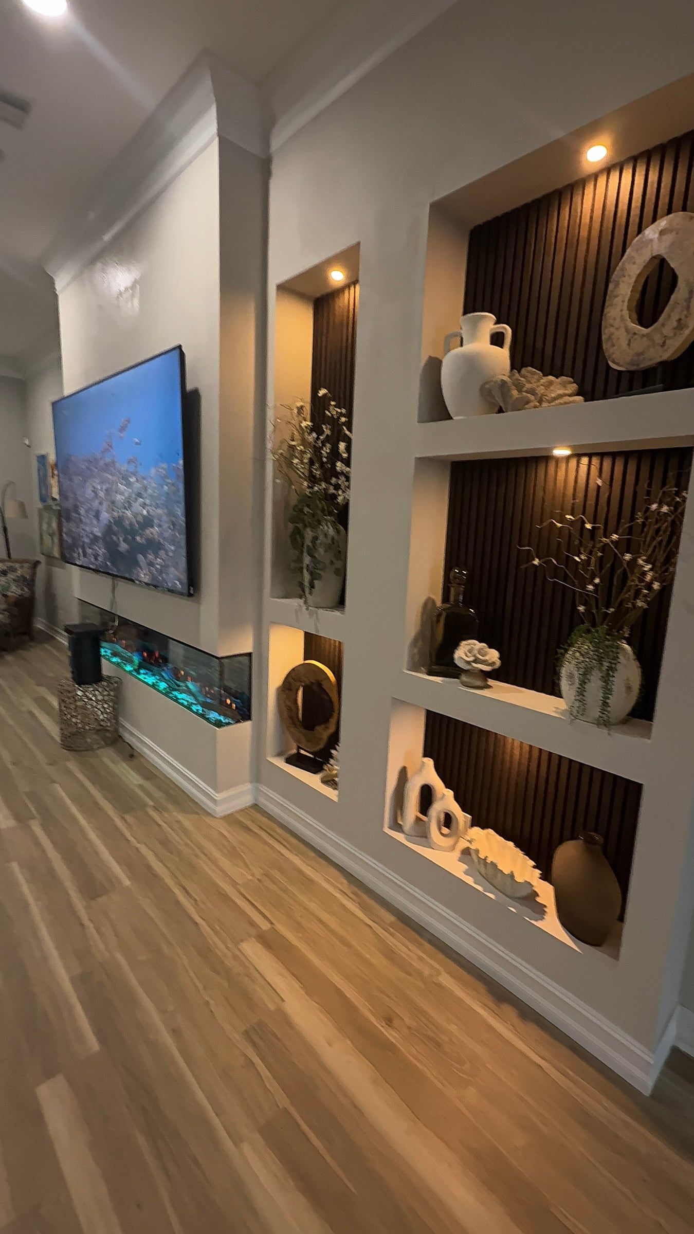 Media Wall with Lit Display Niches and Linear Fireplace in Melbourne, FL — photo 26 of 27