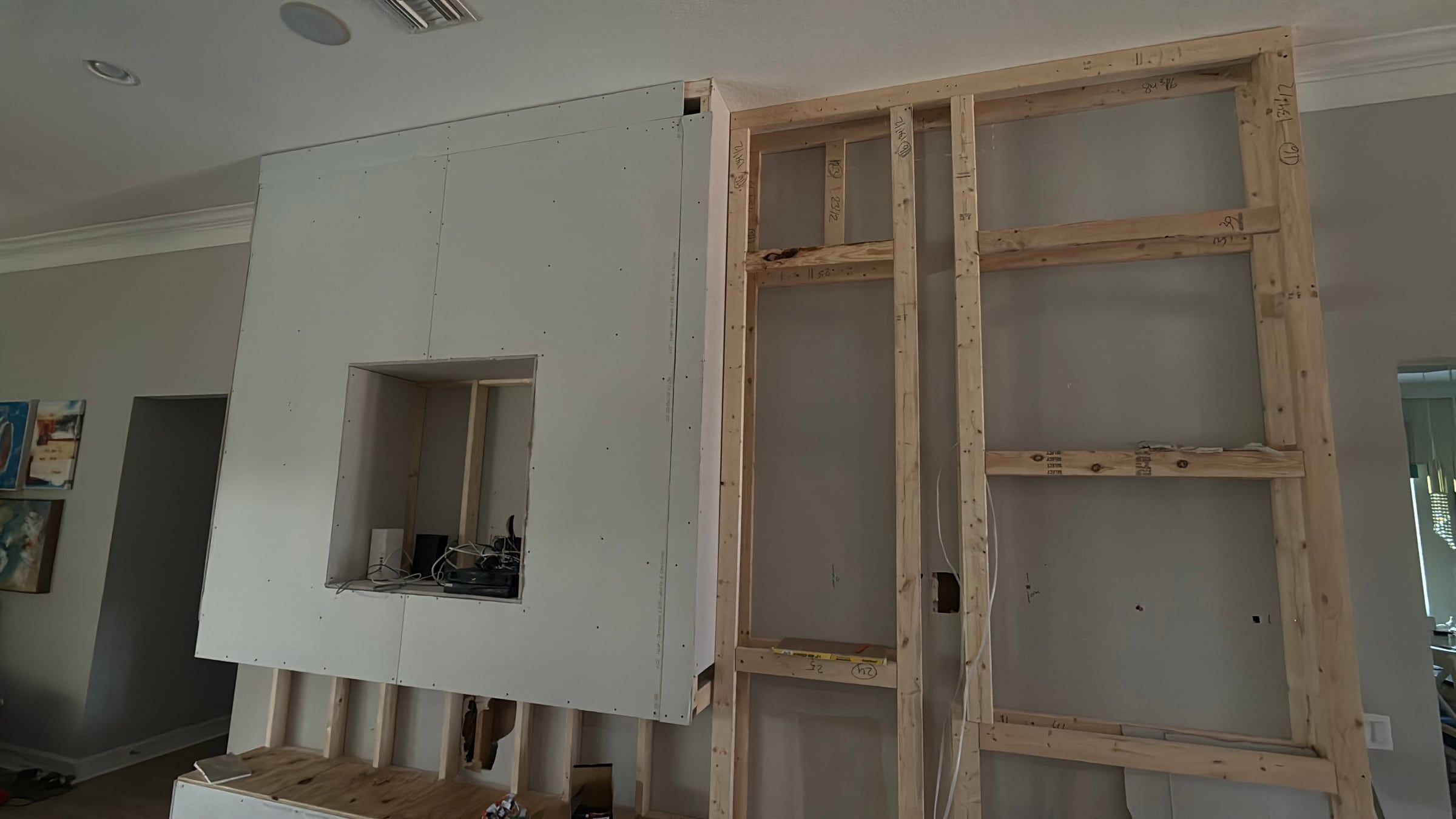 Media Wall with Lit Display Niches and Linear Fireplace in Melbourne, FL — photo 8 of 27