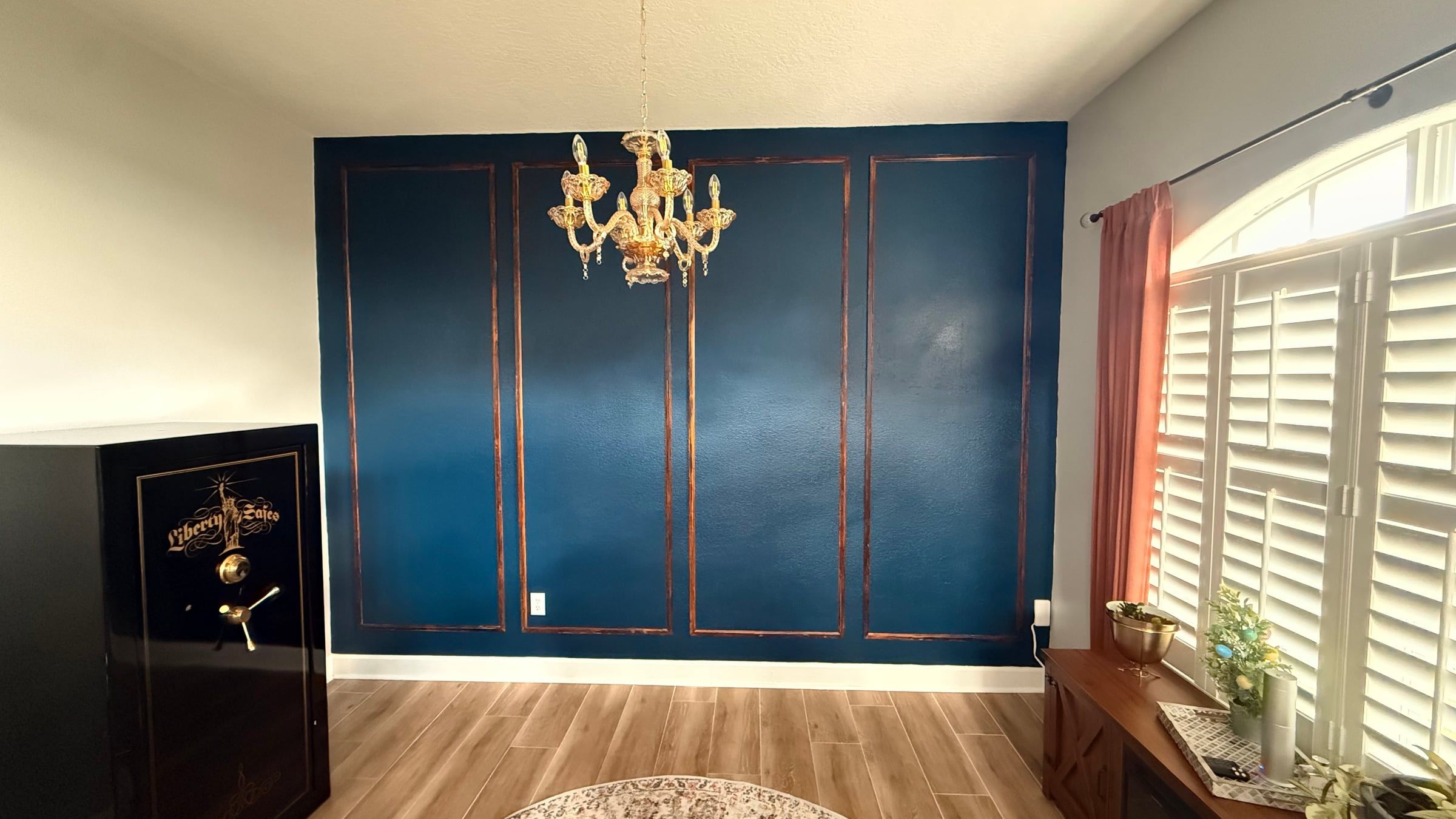 Navy Accent Wall with Picture-Frame Molding in Melbourne, FL