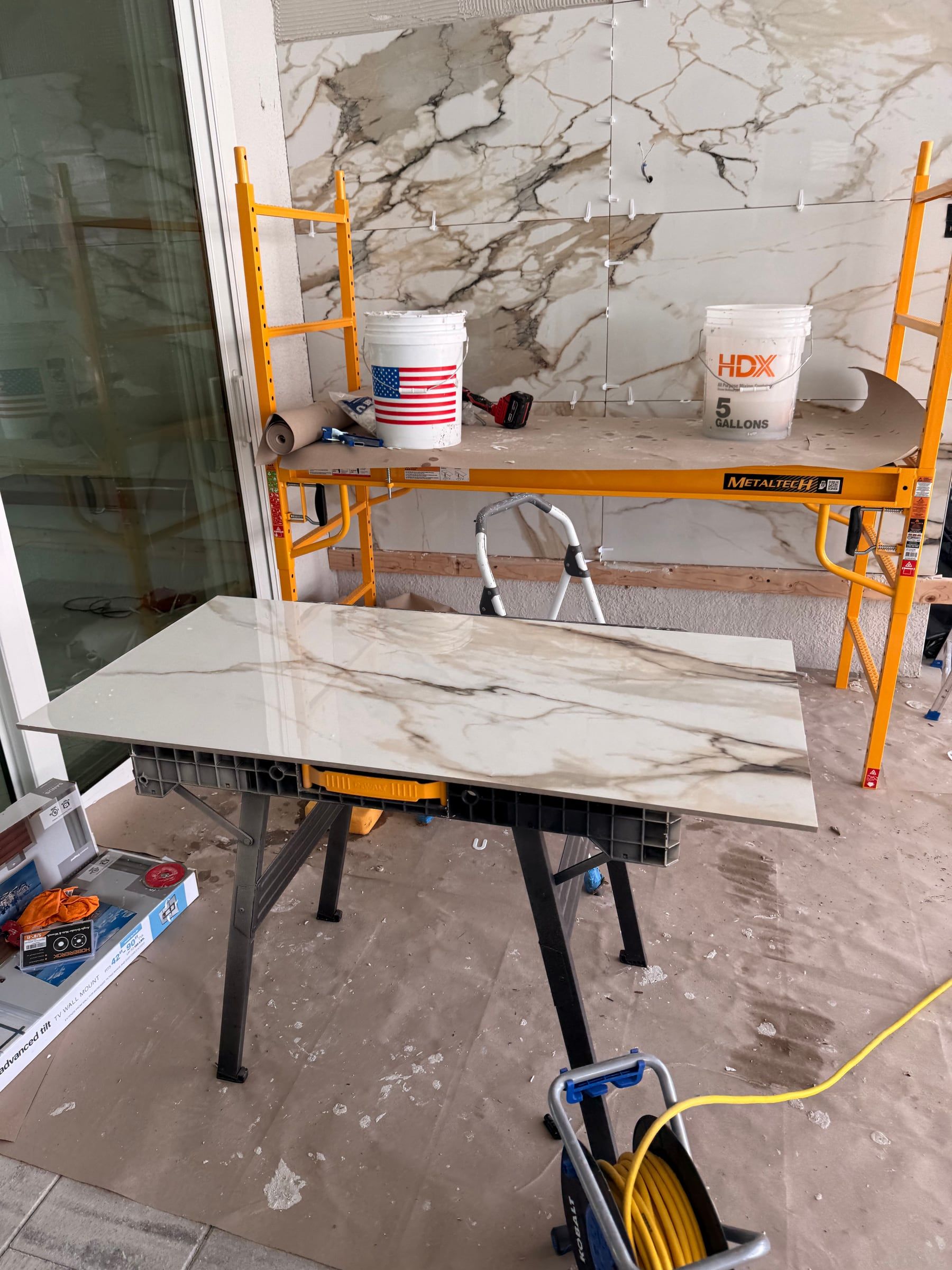 Porcelain Slab Accent Wall in Winter Garden, FL — photo 1 of 4