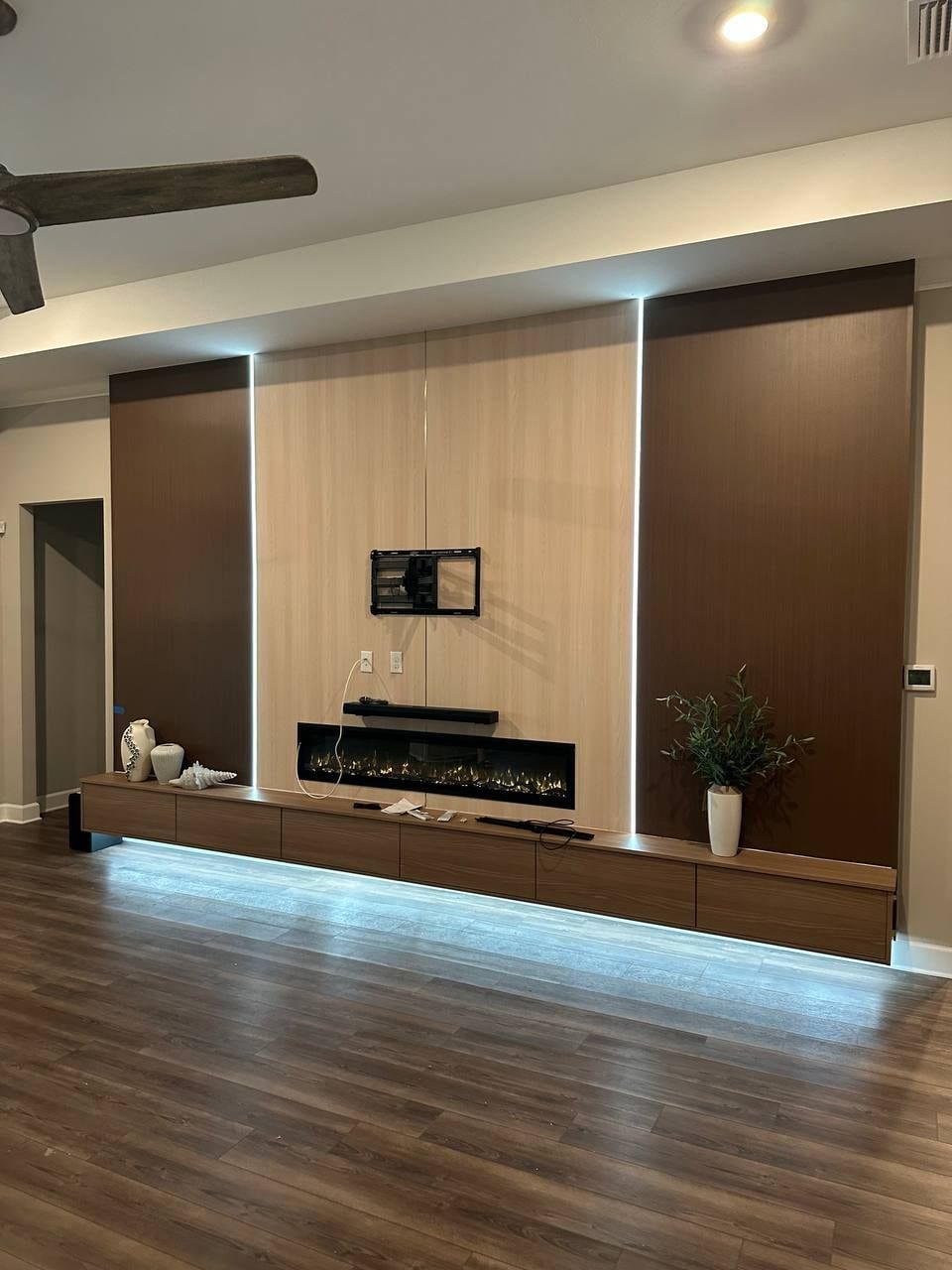 Media Wall with Electric Fireplace Built from the Studs in Orlando, FL — photo 1 of 12
