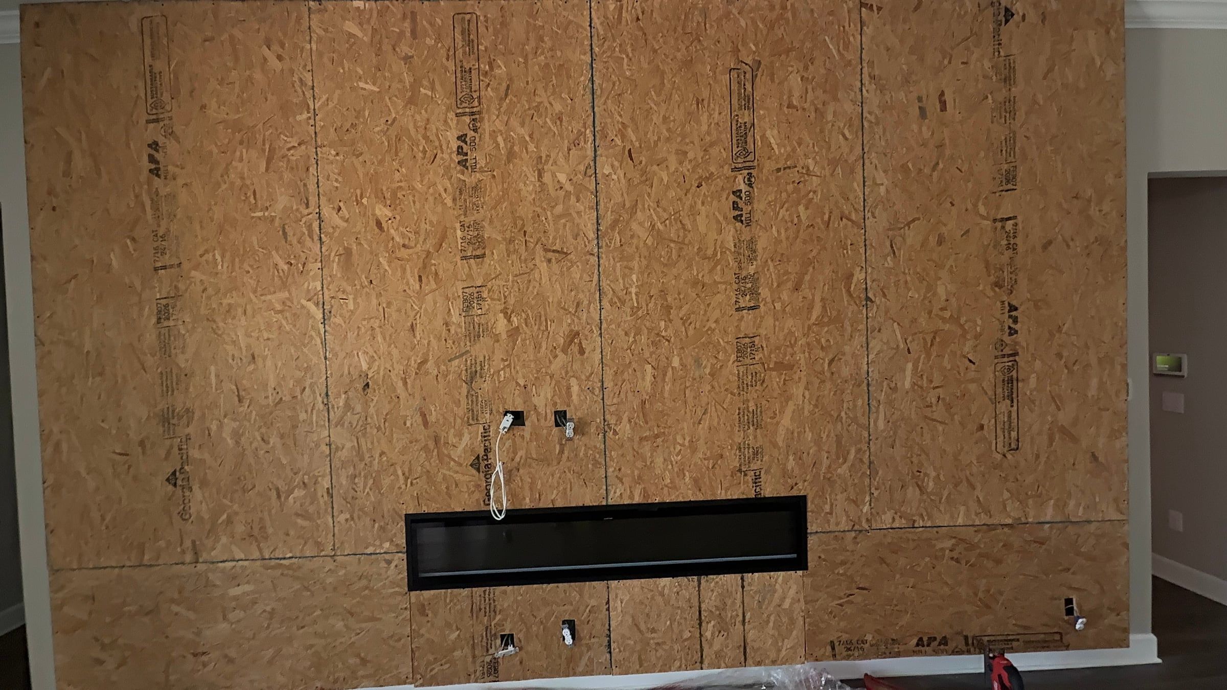 Media Wall with Electric Fireplace Built from the Studs in Orlando, FL — photo 10 of 12