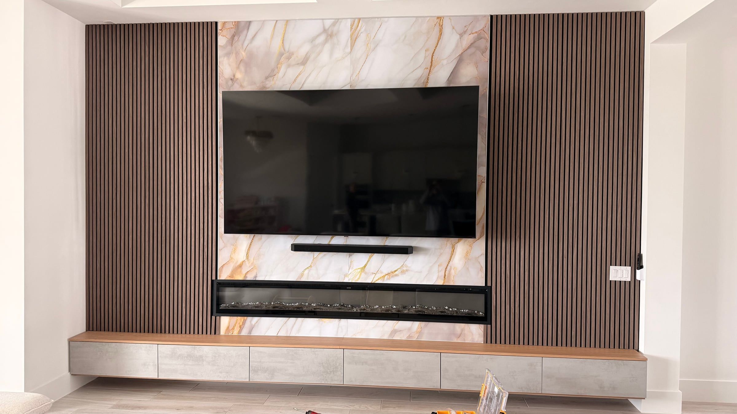 Wood Slat Media Wall with Linear Electric Fireplace in Orlando, FL — photo 5 of 6