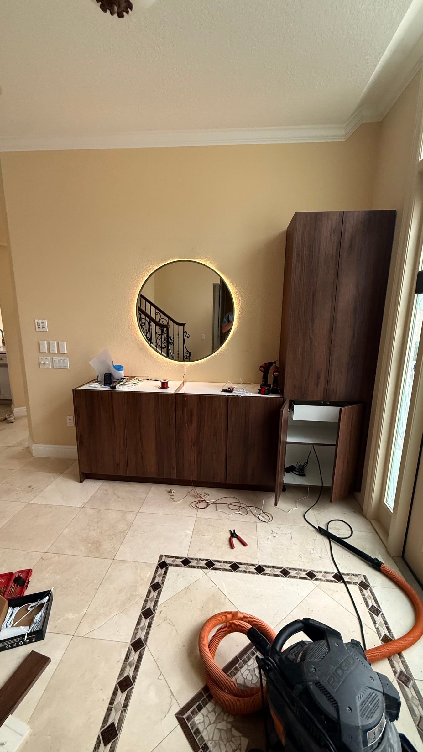 Wood Slat Wall with a Mirror Niche and Floating Vanity in Sarasota, FL — photo 1 of 4