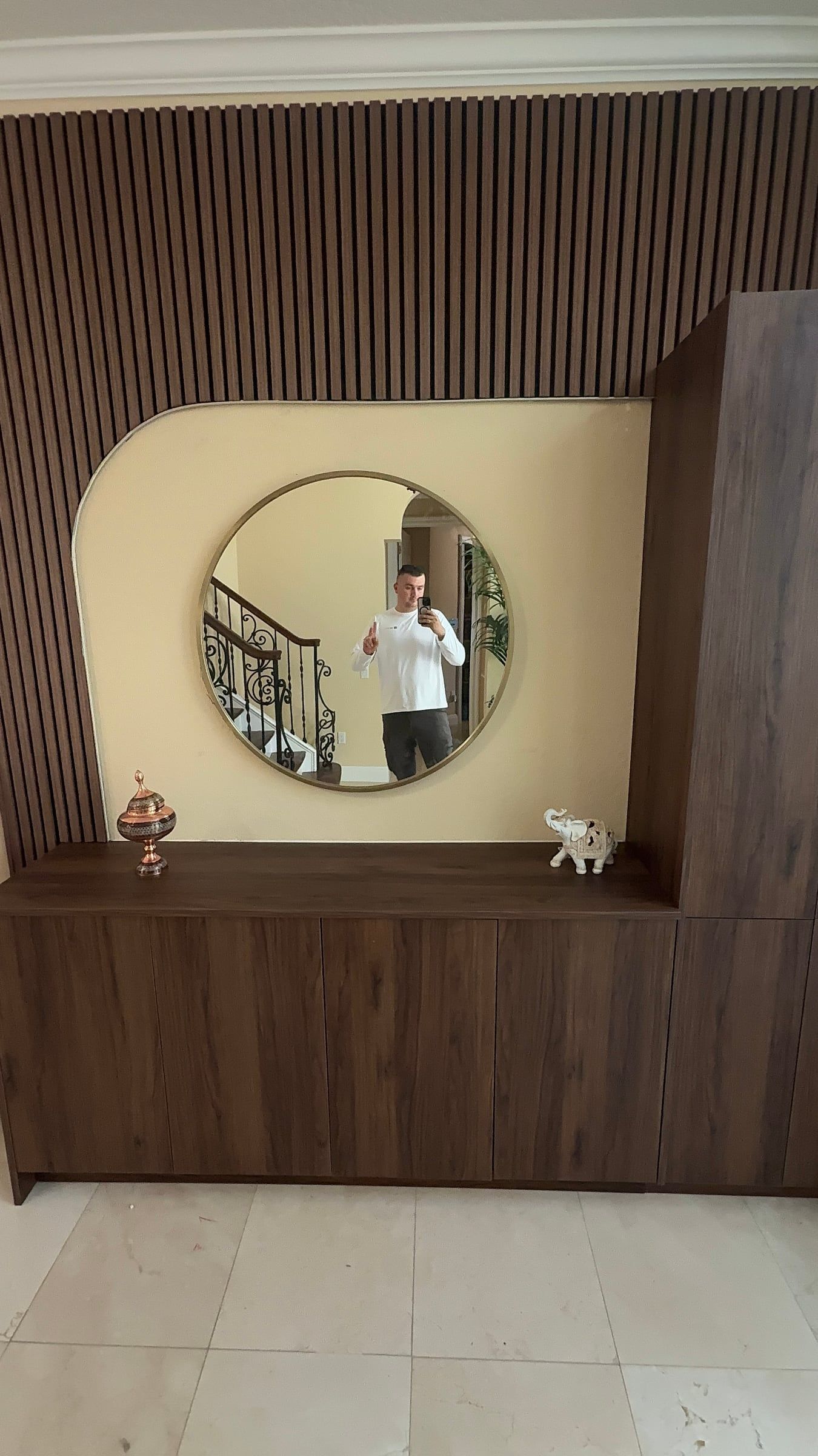 Wood Slat Wall with a Mirror Niche and Floating Vanity in Sarasota, FL — photo 4 of 4